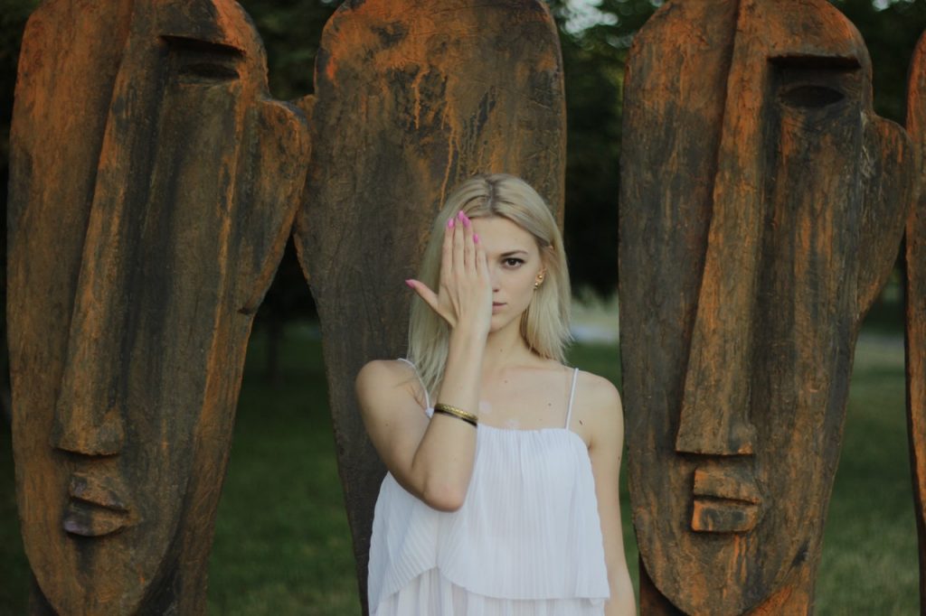 Girl covering half of face